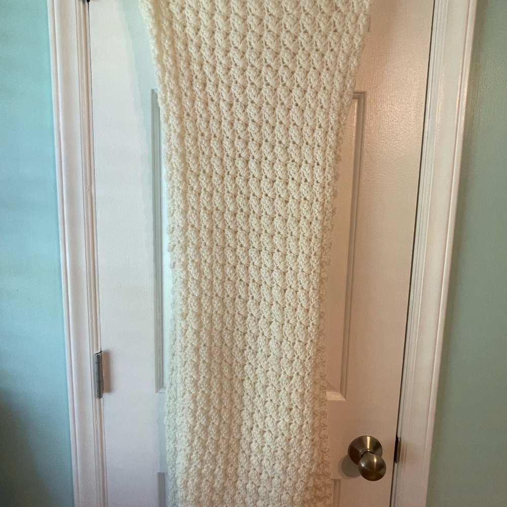 Cozy handmade crocheted cream colored throw/baby blanket.
